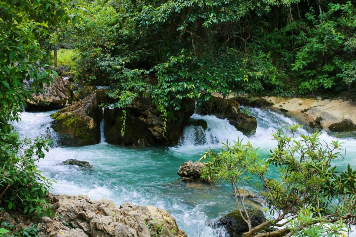 Clear blue water of Lenin Stream near Pac Bo Cave