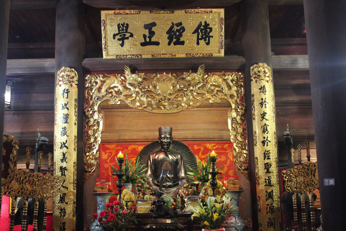 Confucius altar inside the Great House of Ceremonies at Temple of Literature Hanoi, where visitors pay respect