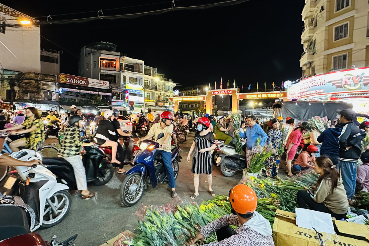Crowded stalls and colorful produce at Dam Market, a cultural landmark in Nha Trang