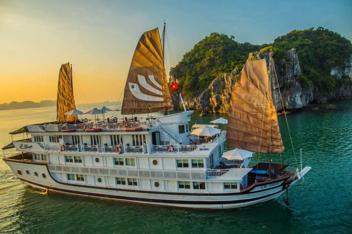 Tourist boat cruising Ha Long Bay on a dry and sunny November day