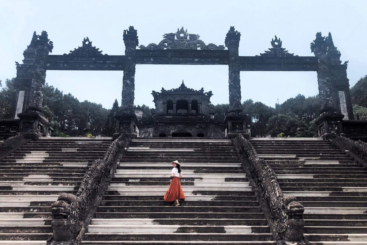 Historic emperor's tomb surrounded by nature in Hue