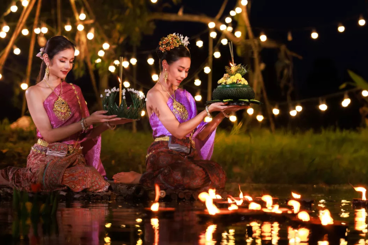  candles floating on the water during the Loy Krathong Festival