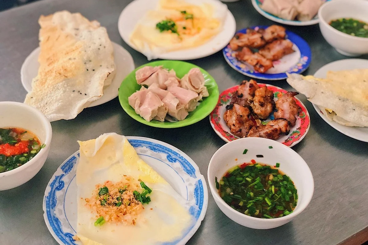 Banh Dap - A crispy rice pancake served with dipping sauce