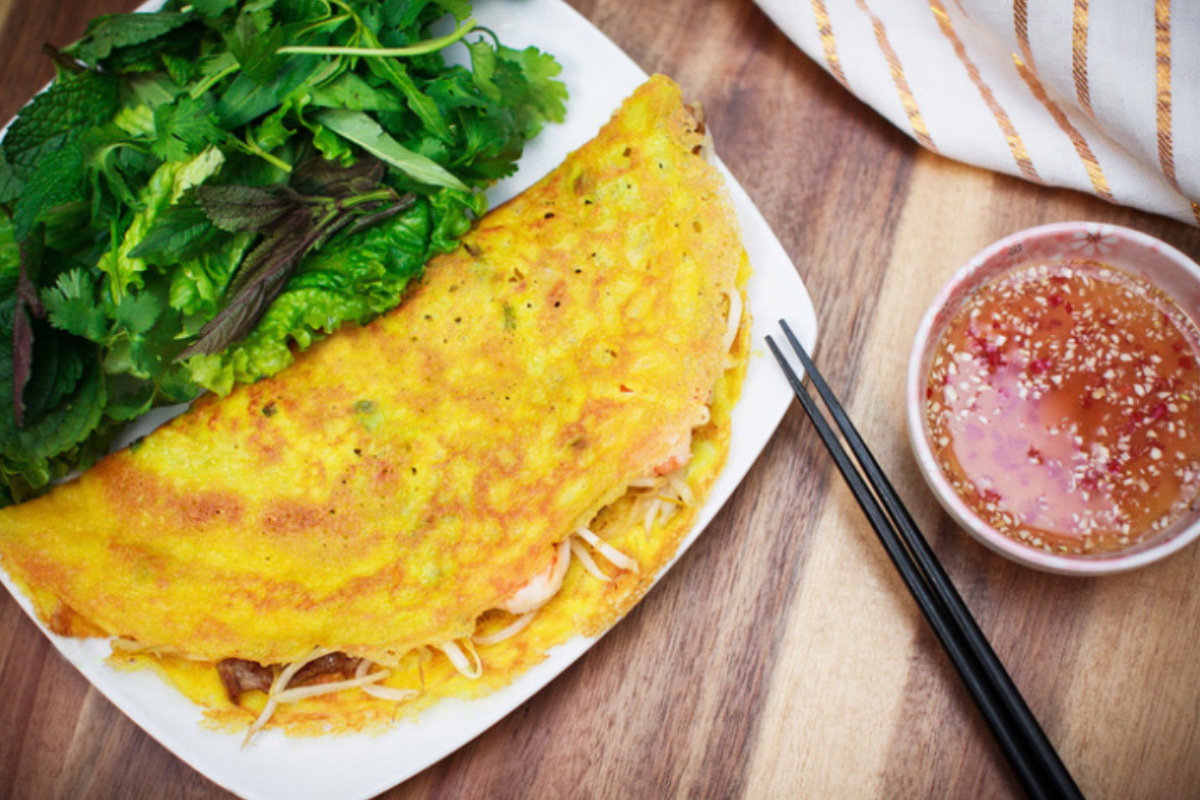 Vietnamese street food stall serving rice paper snacks