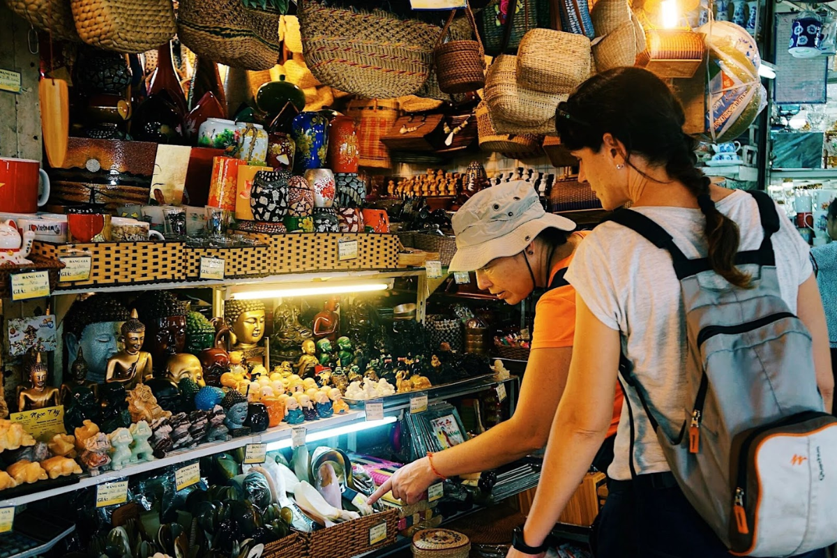 Entrance of Ben Thanh Market bustling with visitors