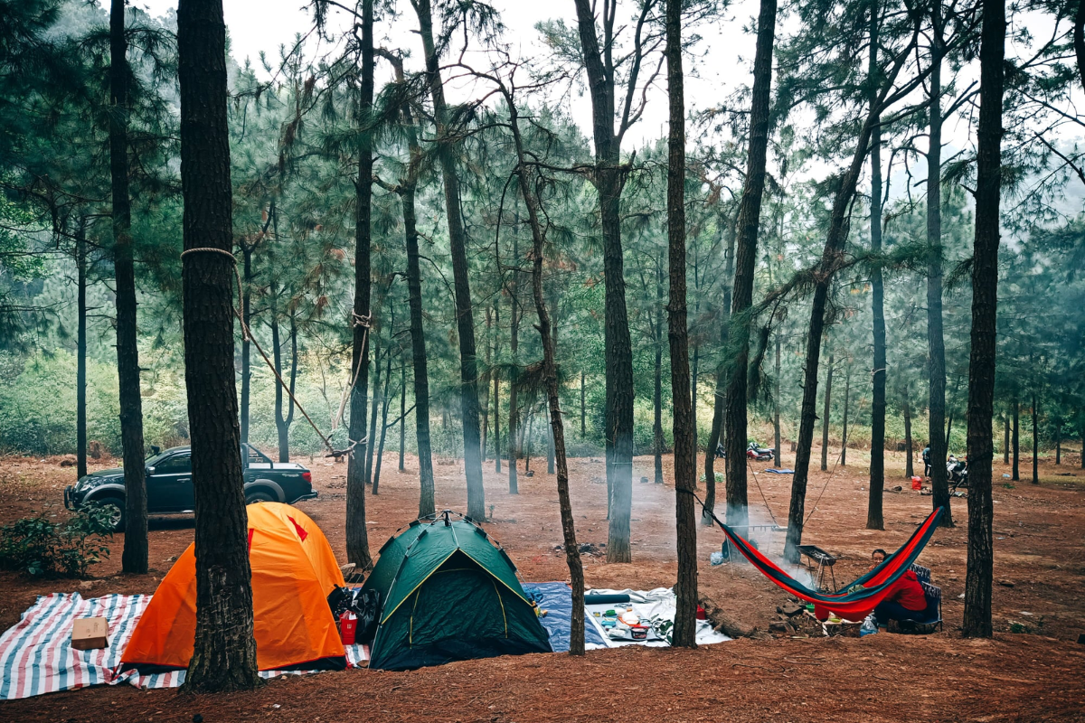 Tent setup at Ham Lon Mountain under a summer sky