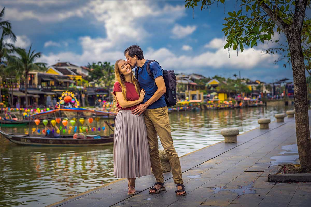 Couple strolling in Hoian Street