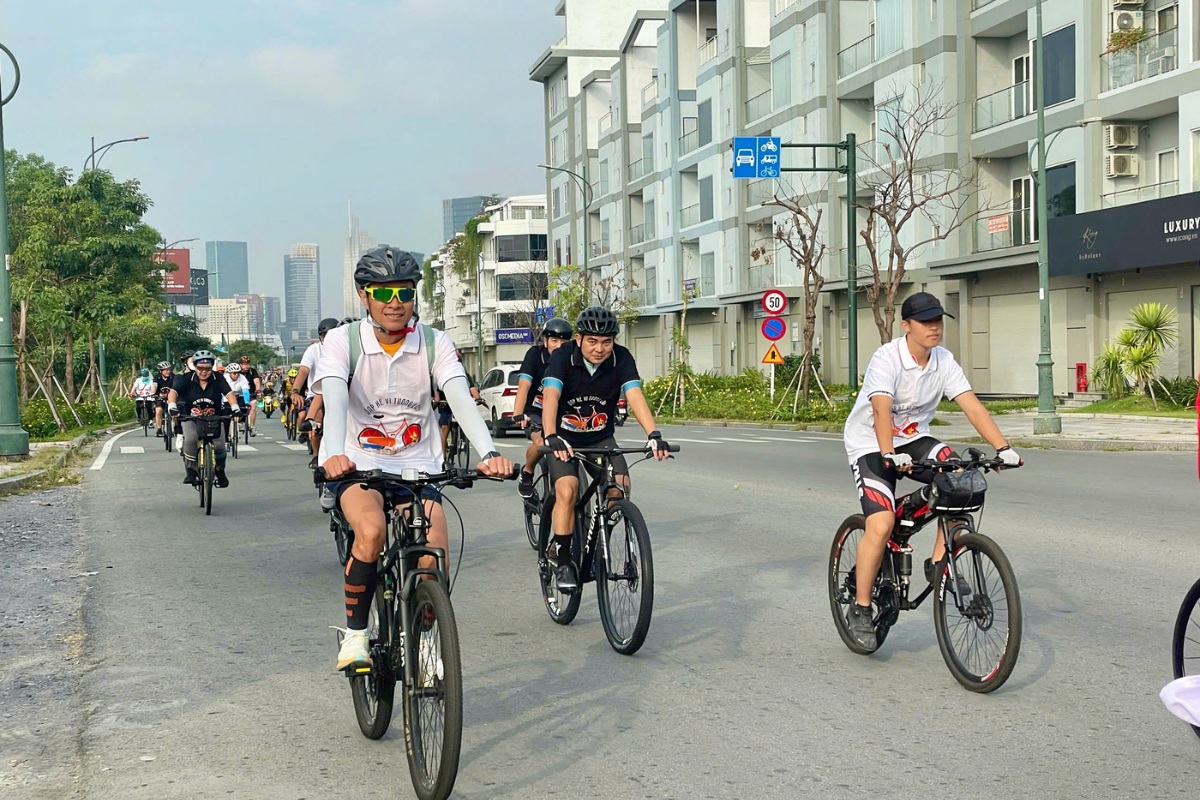Cyclists exploring a quiet street in Ho Chi Minh City