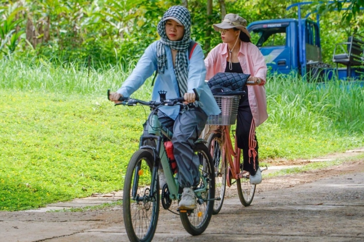 Cyclist in Cat Tien National Park jungle path