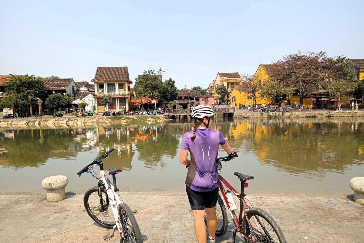Cyclist riding through Hoi An Ancient Town