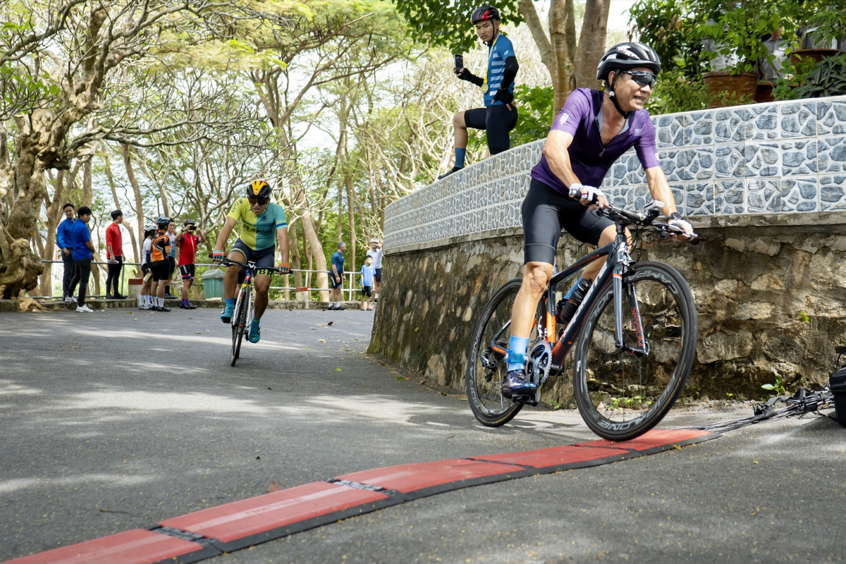 Cyclist on seaside road in Vung Tau