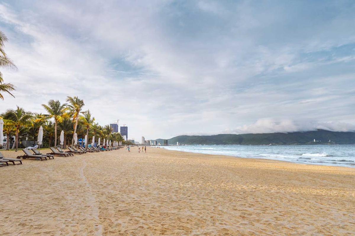 A picturesque beach in Da Nang with golden sand and clear blue waters