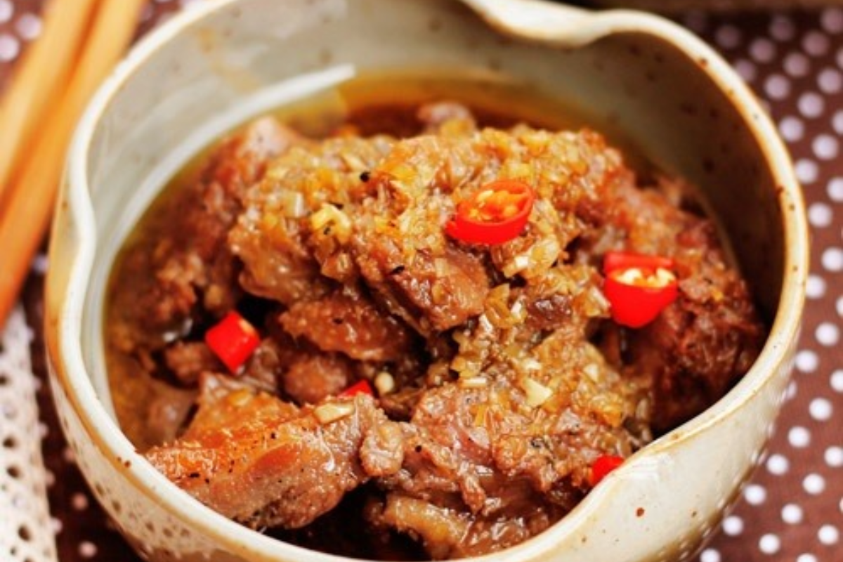 Traditional Nung Din ginger pork meat marinated and served with rice in Sapa
