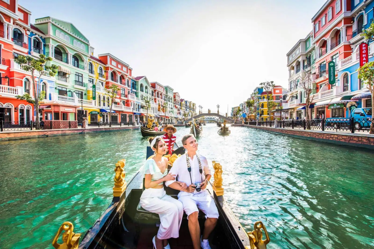 Colorful Venetian-style buildings lining a canal at Grand World Phu Quoc