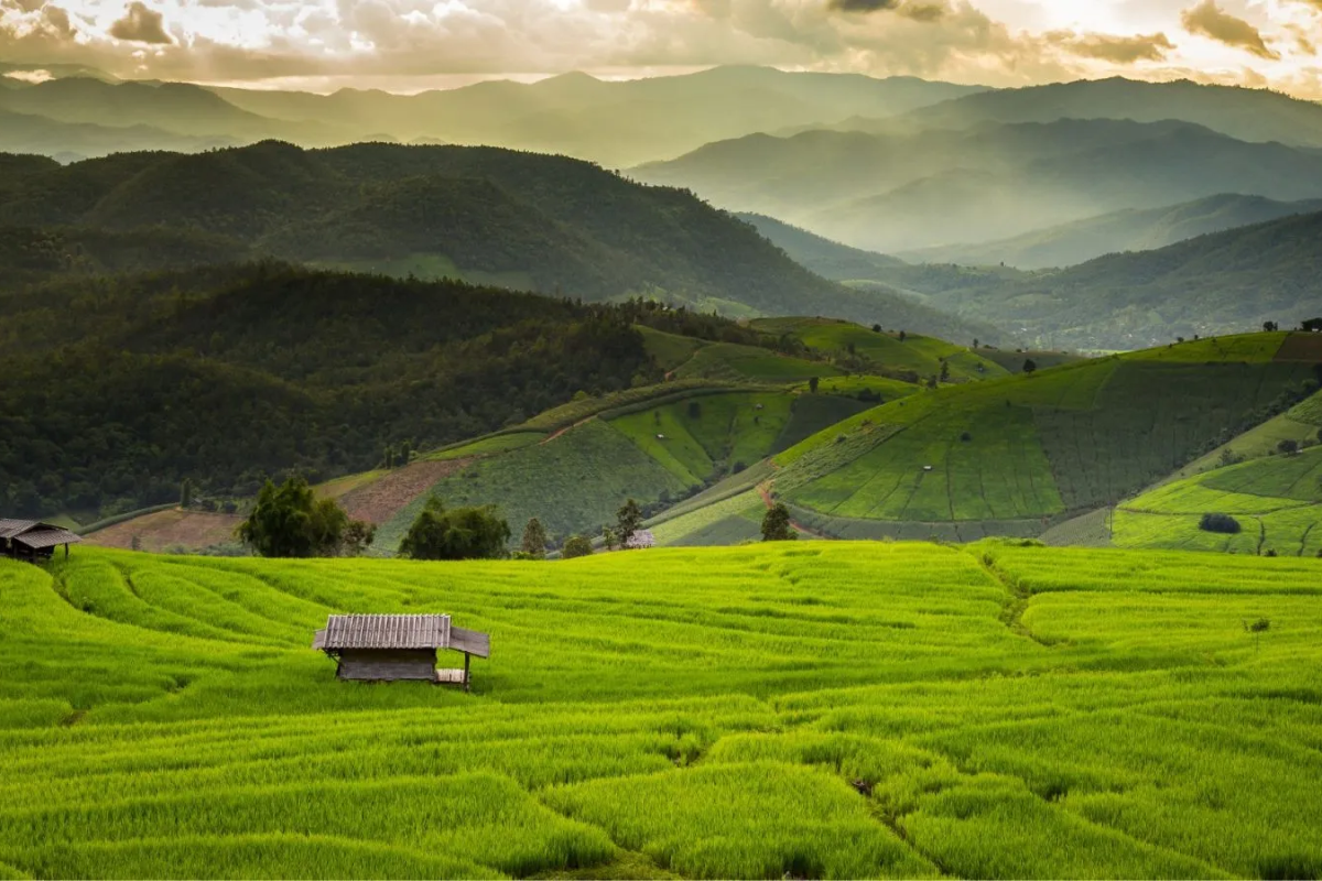 Overcast skies and green hills in Chiang Mai during September
