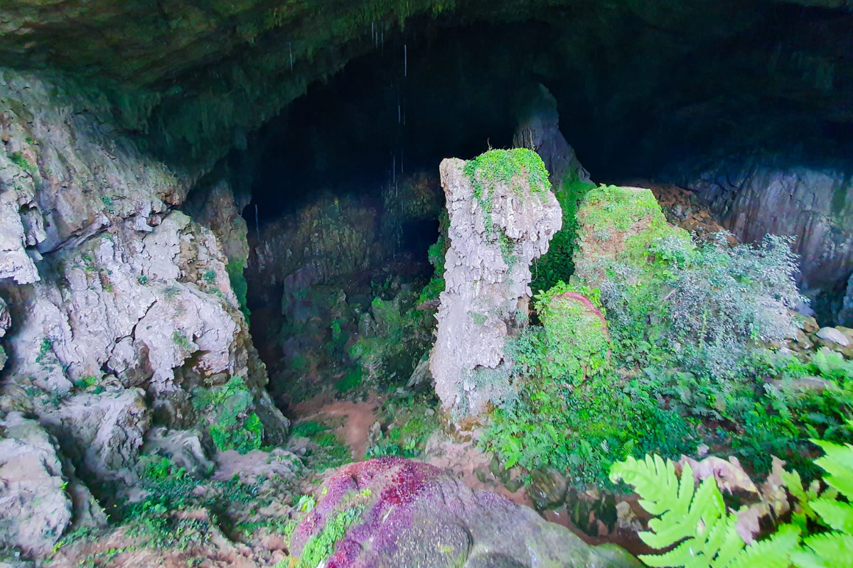 Stalactites and rock formations inside the ancient Kho Muong Cave, a natural wonder in Pu Luong