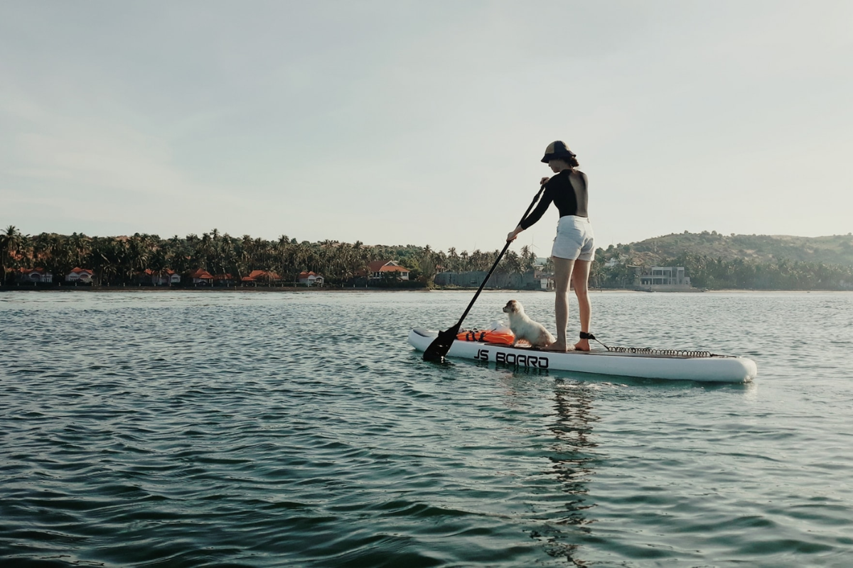 Paddleboarder balancing in the sea near Mui Ne