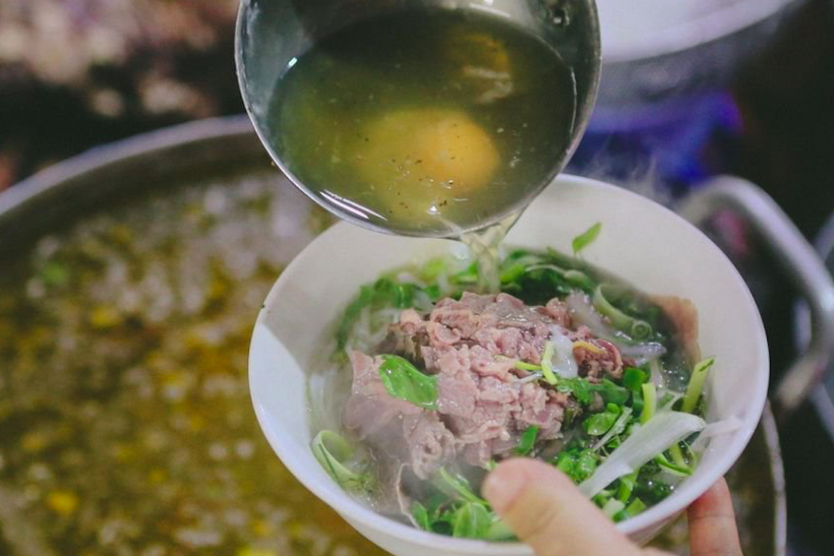 A steaming bowl of pho in Hanoi during winter