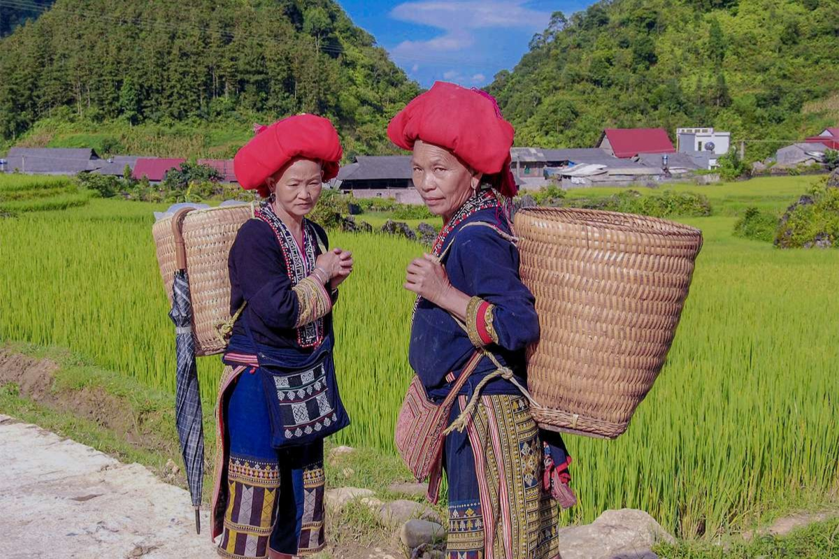 Red Dao women in traditional clothing at Ta Phin Village