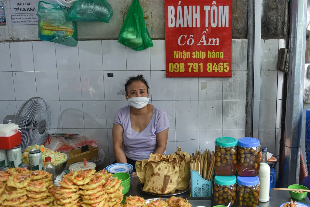 Street food stalls at Dong Xuan Market in Hanoi
