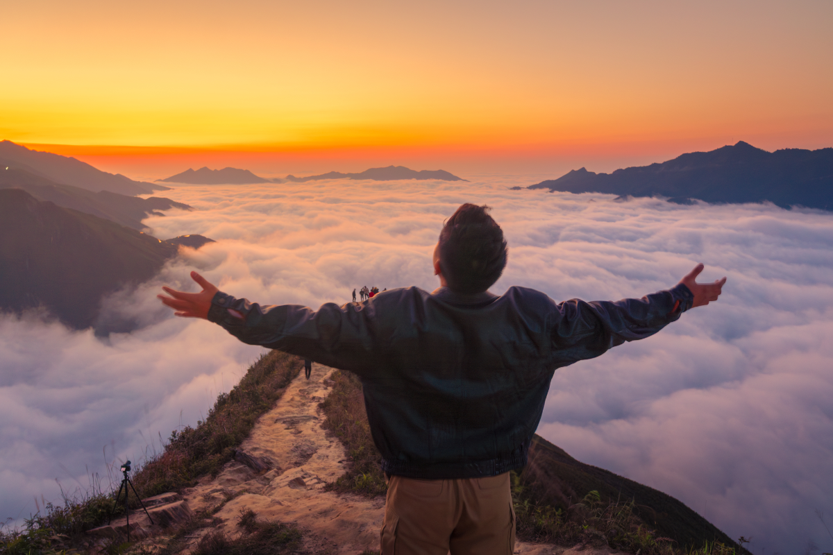 Clouds covering Ta Xua Peak at sunrise