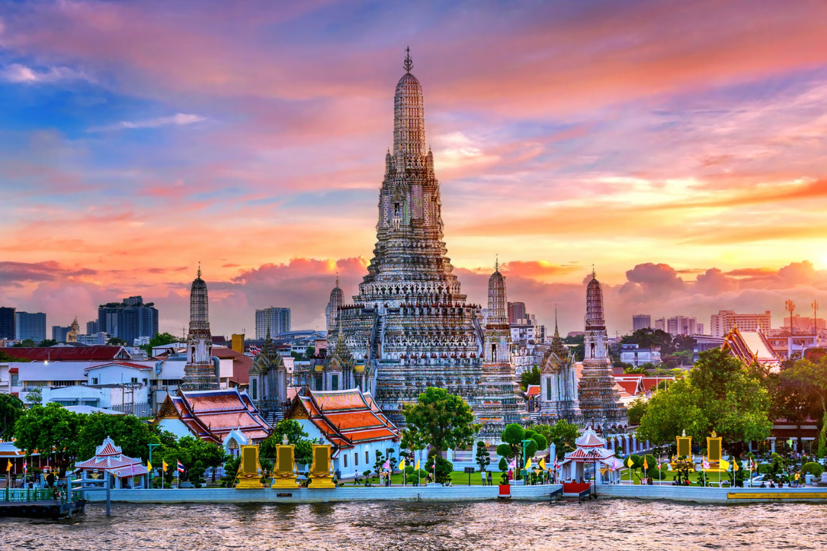 Sunrise view over Bangkok skyline in January with clear skies and soft golden light