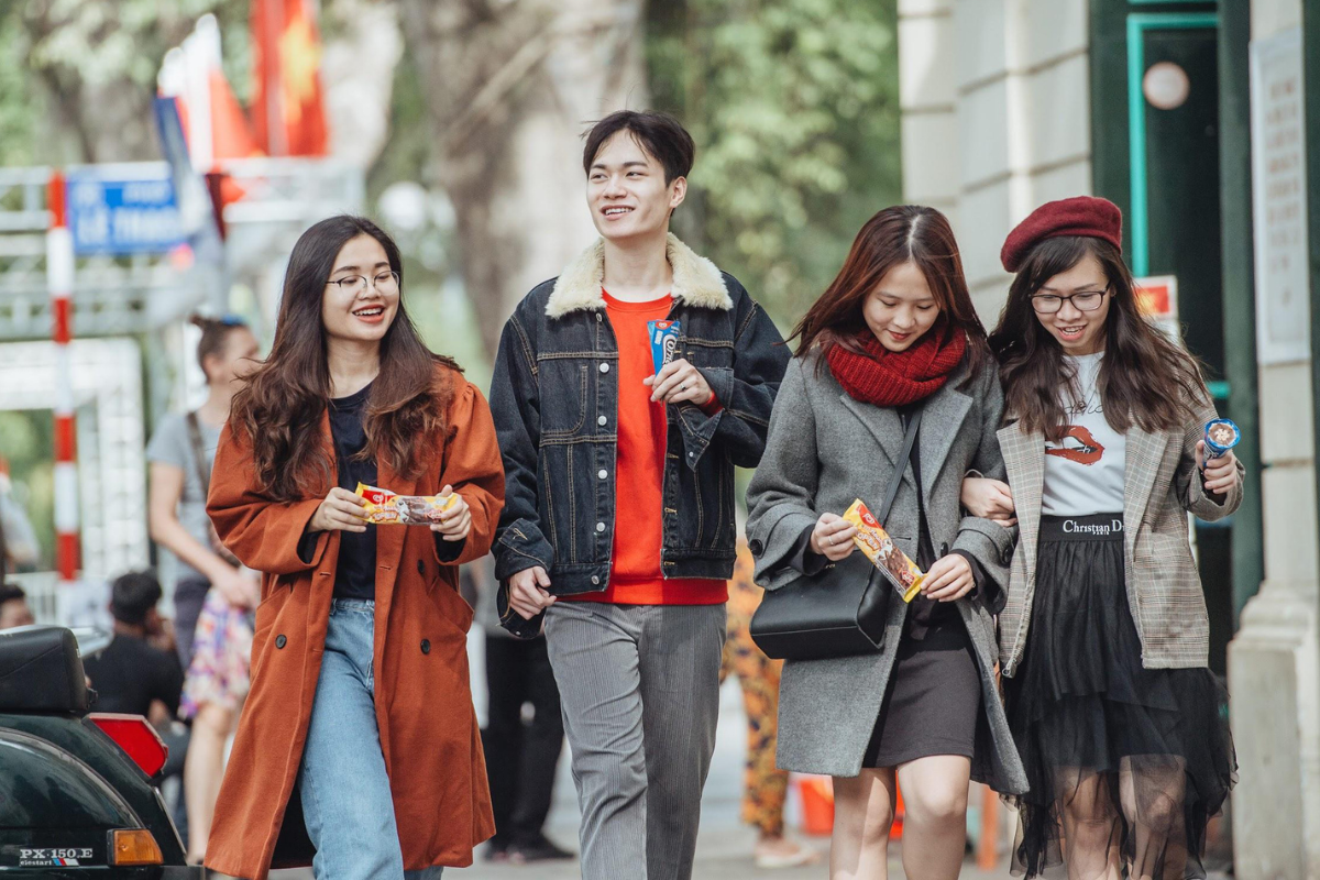 Tourists walking through Hanoi's Old Quarter in January