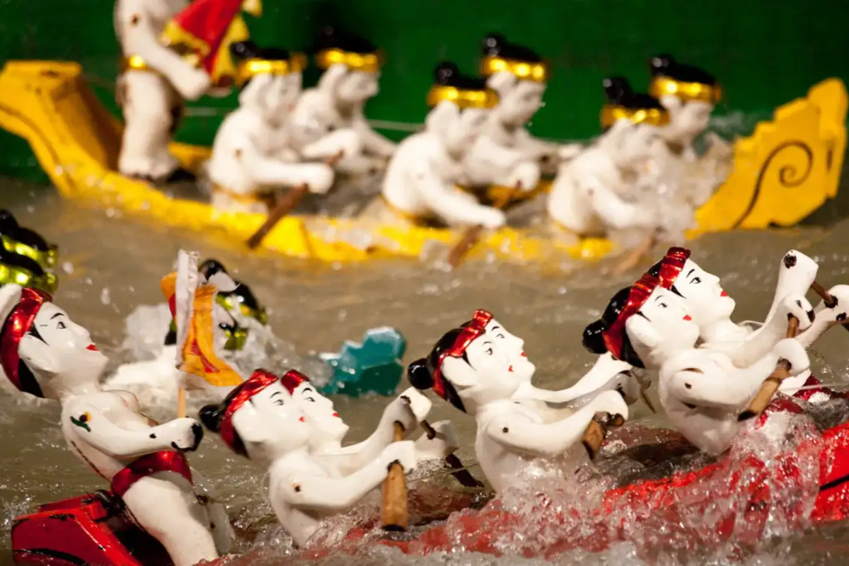 Traditional water puppet performance at Golden Dragon Theater